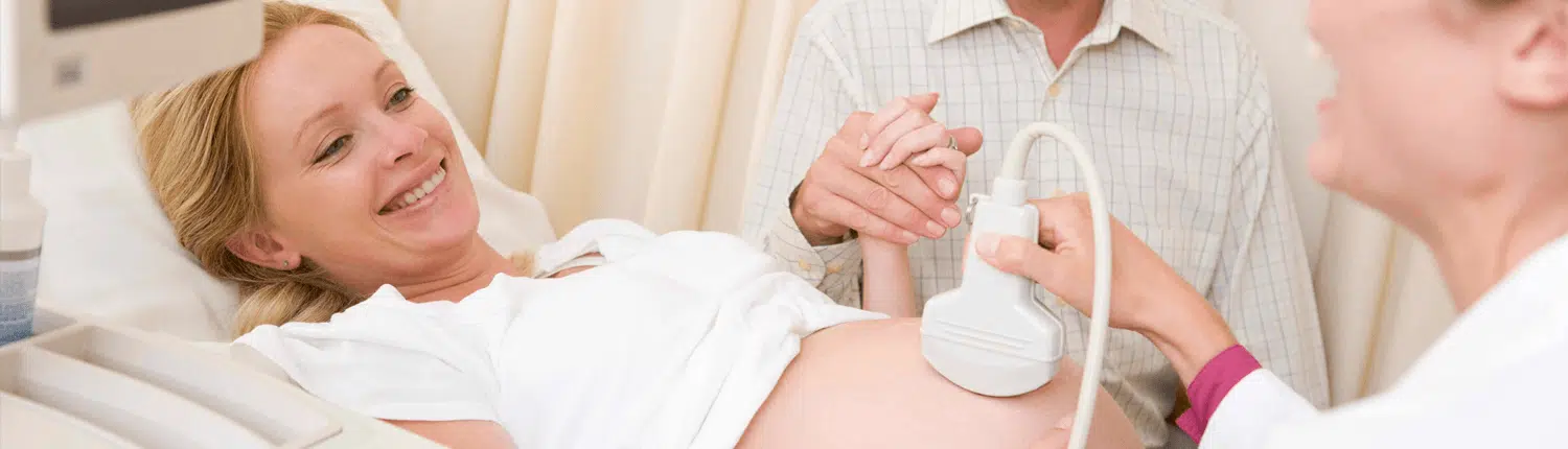 Sonographer performing a growth ultrasound scan at Sonoworld London clinic